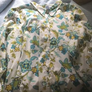 White button down blouse with blue paisleys on it